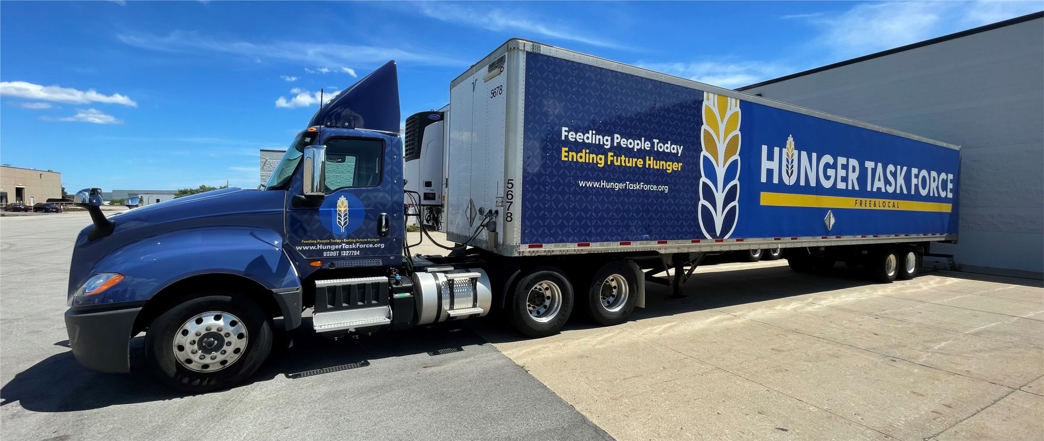 Semi truck with Hunger Task Force's logo on the side.